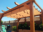 Instalaci&oacute;n de P&eacute;rgola de Madera pared - porter&iacute;a.